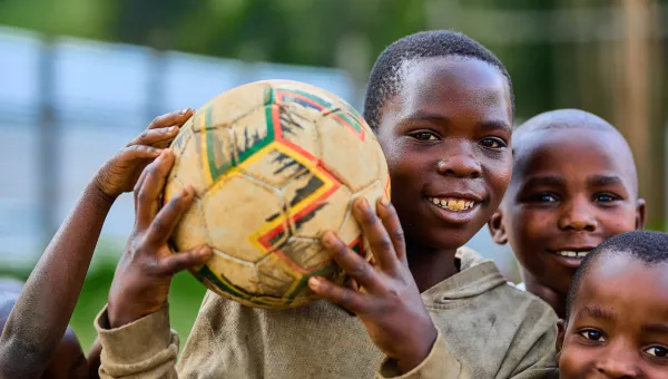 A boy holding a football
