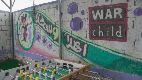 School in Yemen with wall art and toys