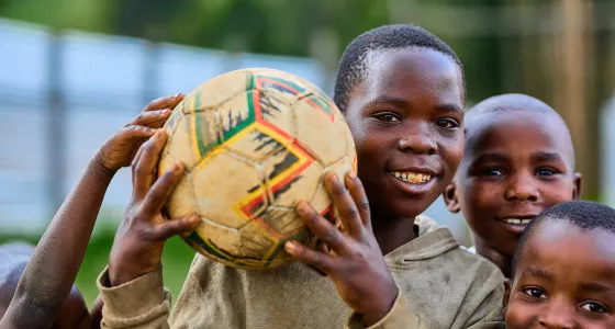 A boy holding a football
